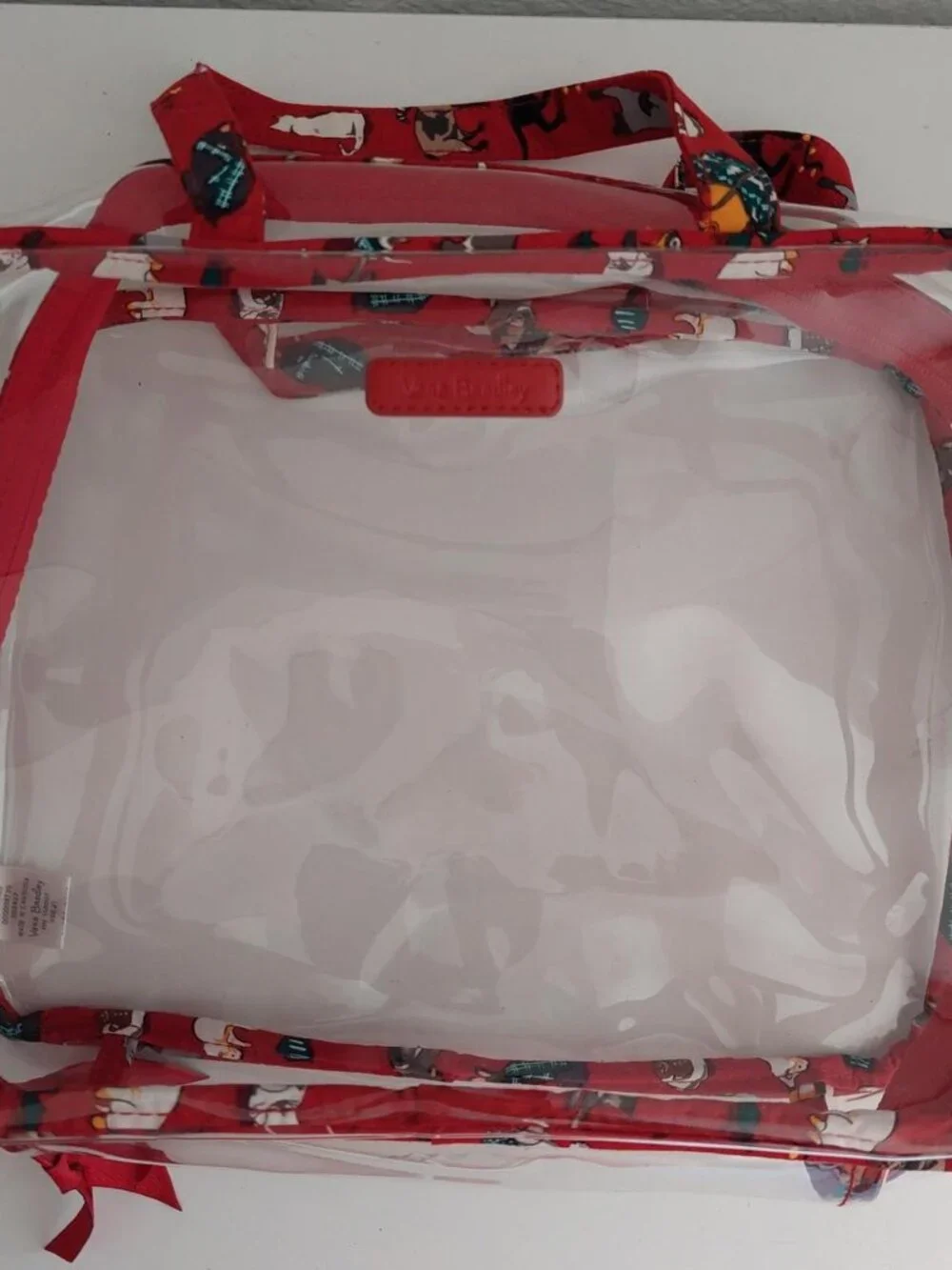 Vera Bradley clear makeup cosmetic bag travel features the whimsical 